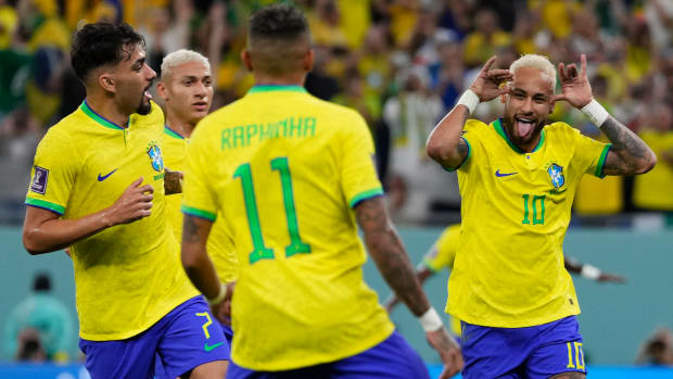 Neymar celebrates with Brazil.
